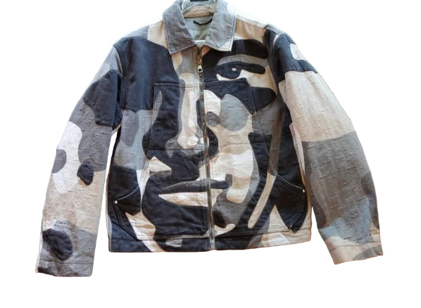 Camouflage jacket on a wooden floor