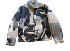 Camouflage jacket on a wooden floor