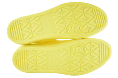 A pair of bright yellow shoe soles with textured geometric tread patterns, shown against a plain white background.