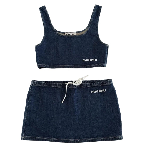 Denim crop top and skirt set with 'miu miu' branding on a light background