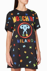 Dress with Moschino logo and space-themed design on a black background