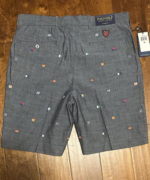 Gray shorts with small colorful patterns on a wooden surface