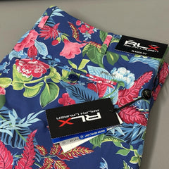 Colorful floral-patterned fabric with a brand label on a white background