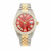 Luxury watch with red face, gold and silver band on white background