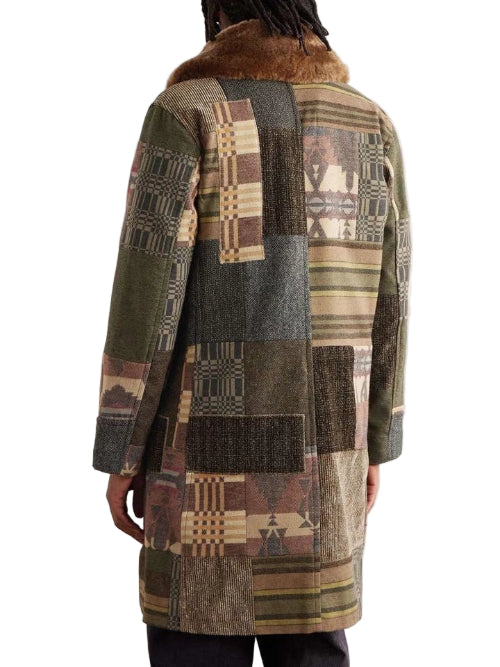 Patchwork coat with a patterned design on a white background