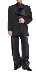 Black suit with a bow tie on a plain background