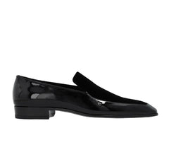 Black shoe with a unique sole design on a white background