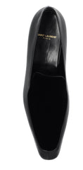 Black dress shoe on a white background