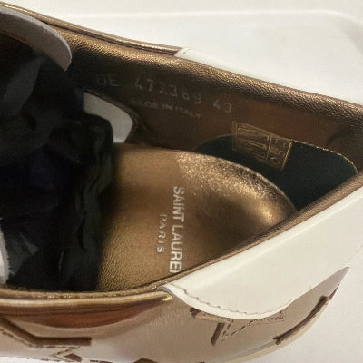 Pair of shoes with a visible brand logo on a white background