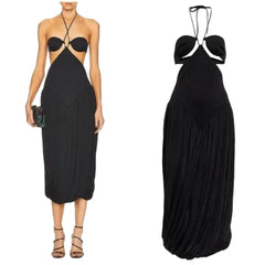 Black halter neck dress with cut-out design on a white background