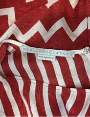 Red and white zigzag patterned fabric with a Stella McCartney label.