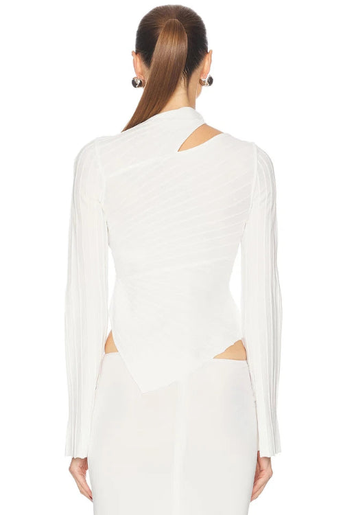 White dress with cut-out design on a white background