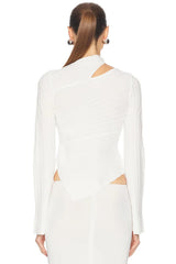 White dress with cut-out design on a white background