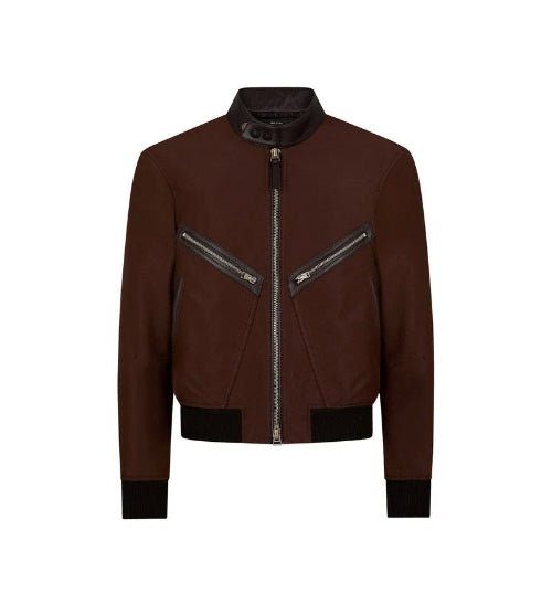 A dark brown faux-leather bomber jacket with black ribbed trim at the collar, cuffs, hem, and two diagonal zippered chest pockets, shown on a plain white background.
