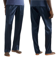 A pair of dark navy blue pants shown from the back on a model, with a small portion of a light blue shirt visible at the top.