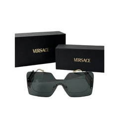 Versace square sunglasses with dark lenses and a black box behind them on a light gray background.