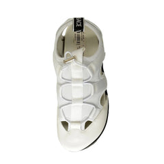 White sandal with a visible brand label on a white background
