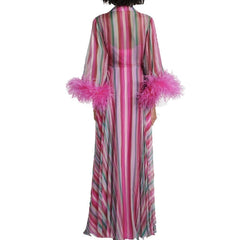 A long pink and multicolor striped robe with fluffy pink feather trim on the sleeves, shown from the back on a model against a white background.