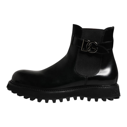 Black rain boot with a brand logo on a white background