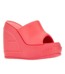 Coral wedge sandal on a white background