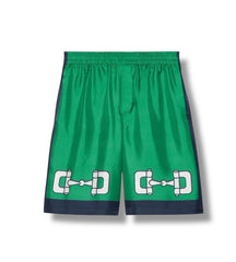 Green shorts with a logo on a white background