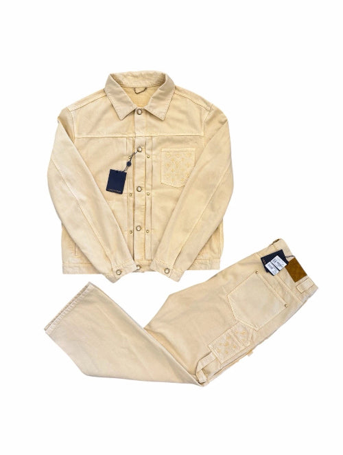 Beige winter coat with matching pants on a white background