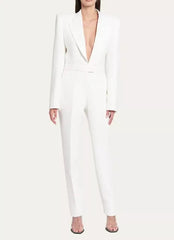 White jumpsuit worn by a model on a white background
