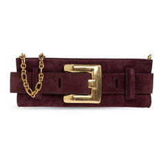 A close-up of a dark burgundy wide belt with a prominent gold-tone buckle and a gold chain detail on the left side.