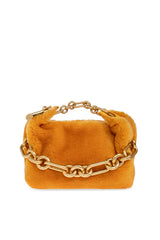 A small mustard yellow suede clutch bag with a gold chain strap, shown against a plain white background.
