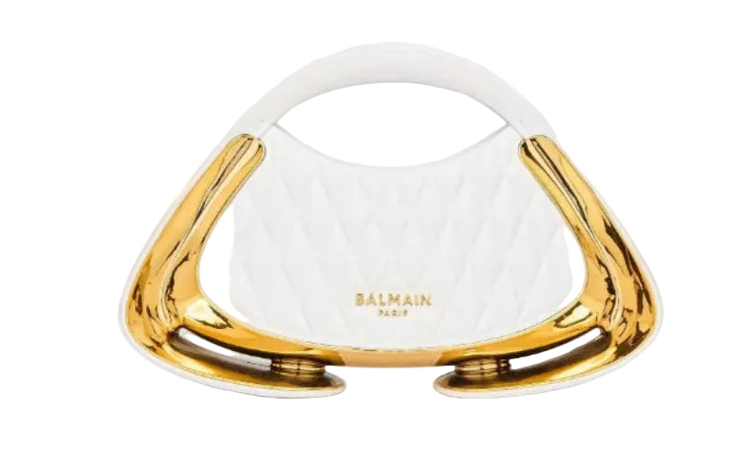 A gold-framed handbag with a white textured body and a white oval top handle, shown against a plain white background.