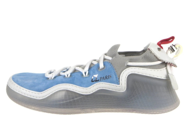 A low-top athletic sneaker in light blue and gray with white laces and a small red accent on the tongue label.