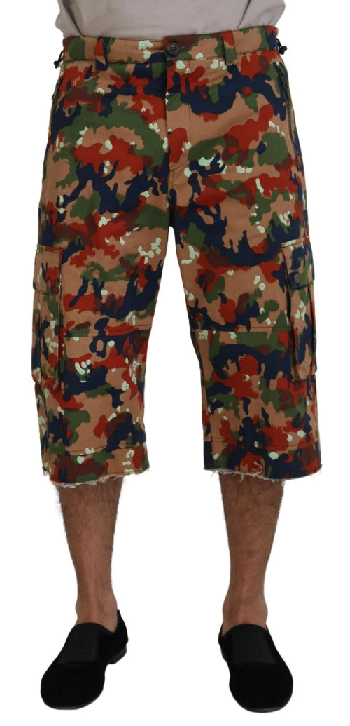 Camouflage shorts worn by a person on a white background