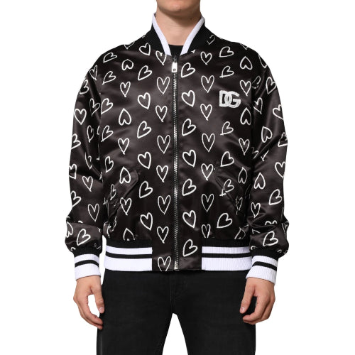 Black jacket with white heart pattern and visible brand logo on a white background