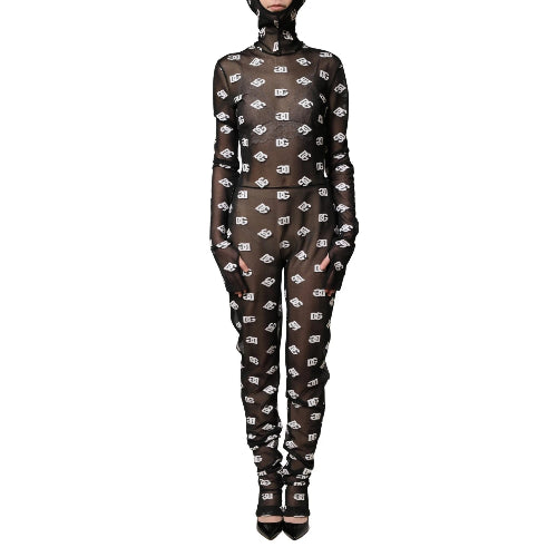 Sheer black outfit with white pattern on a white background