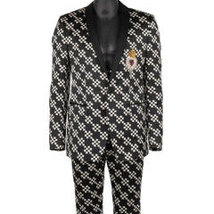 Black and white checkered suit with a decorative patch on a mannequin against a white background
