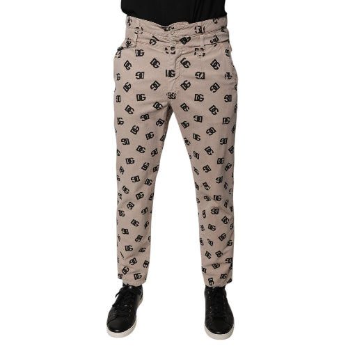 Beige pants with black pattern on a white background