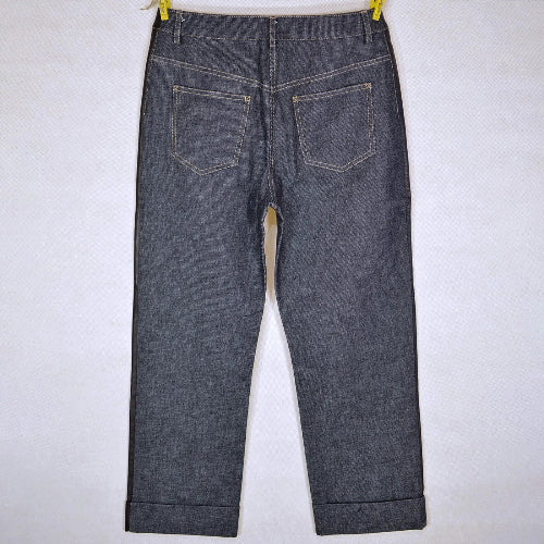 Pair of dark blue jeans on a white background