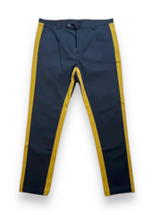Navy pants with yellow stripes on a white background