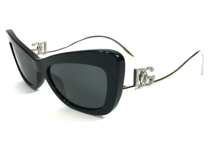 Black sunglasses with decorative metal frame on a white background