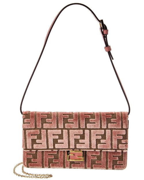 Pink patterned handbag with a chain detail on a white background
