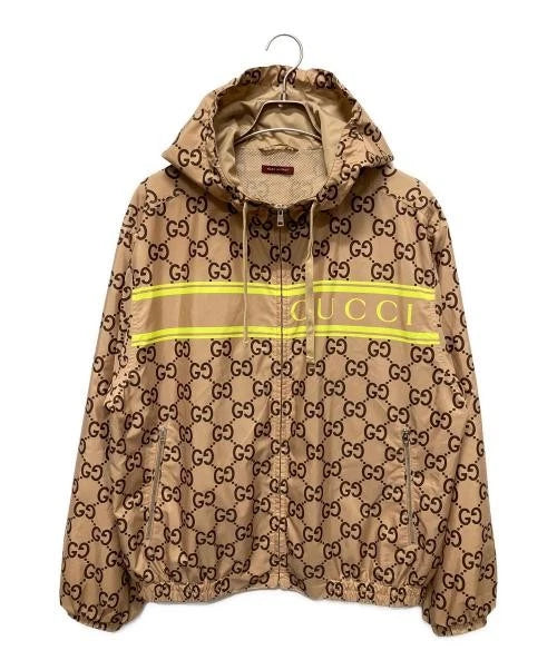 Beige Gucci jacket with logo pattern on a white background