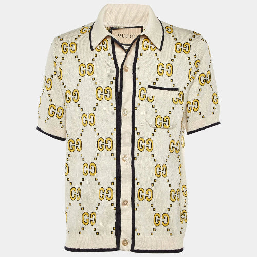 Beige shirt with Gucci logo pattern on a white background