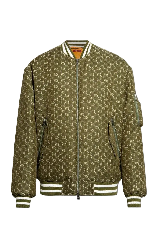 A bomber jacket featuring an all-over olive green and brown monogram pattern, with striped ribbed collar, cuffs, and hem, and zippered pockets.