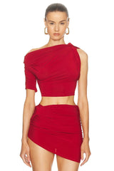 Red one-shoulder top and skirt set on a white background