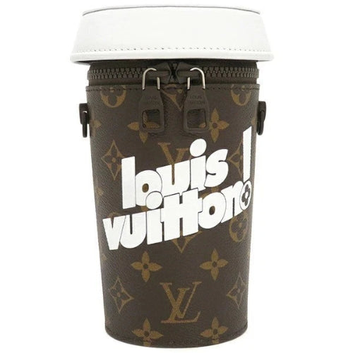 Louis Vuitton coffee cup with monogram pattern on a white background