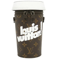 Louis Vuitton coffee cup with monogram pattern on a white background