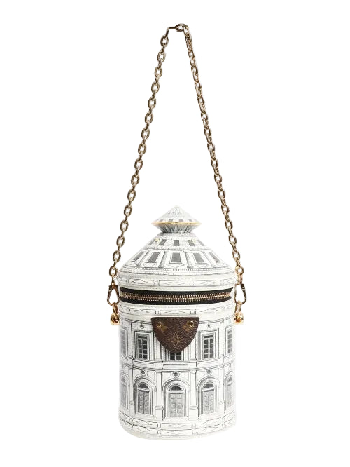 Decorative cylindrical container with architectural design and gold chain on a white background