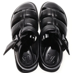 Pair of black sandals on a white background