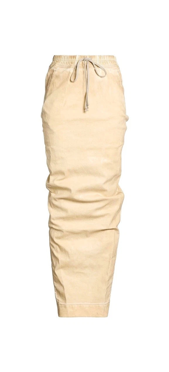 Beige drawstring pants with a relaxed, slightly wrinkled fit, shown against a plain white background.