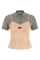 Two-tone shirt with gray and beige sections on a white background
